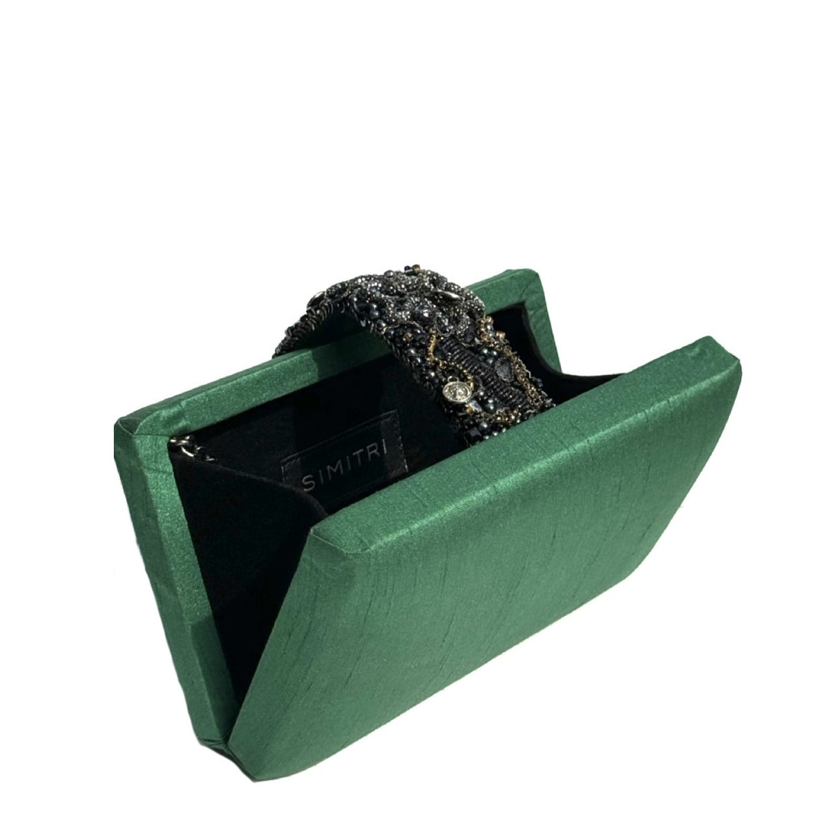 A green satin clutch bag with a black beaded handle, presented in its matching green velvet box with a black interior. The brand name 'SIMITRA' is visible on the inner tag.