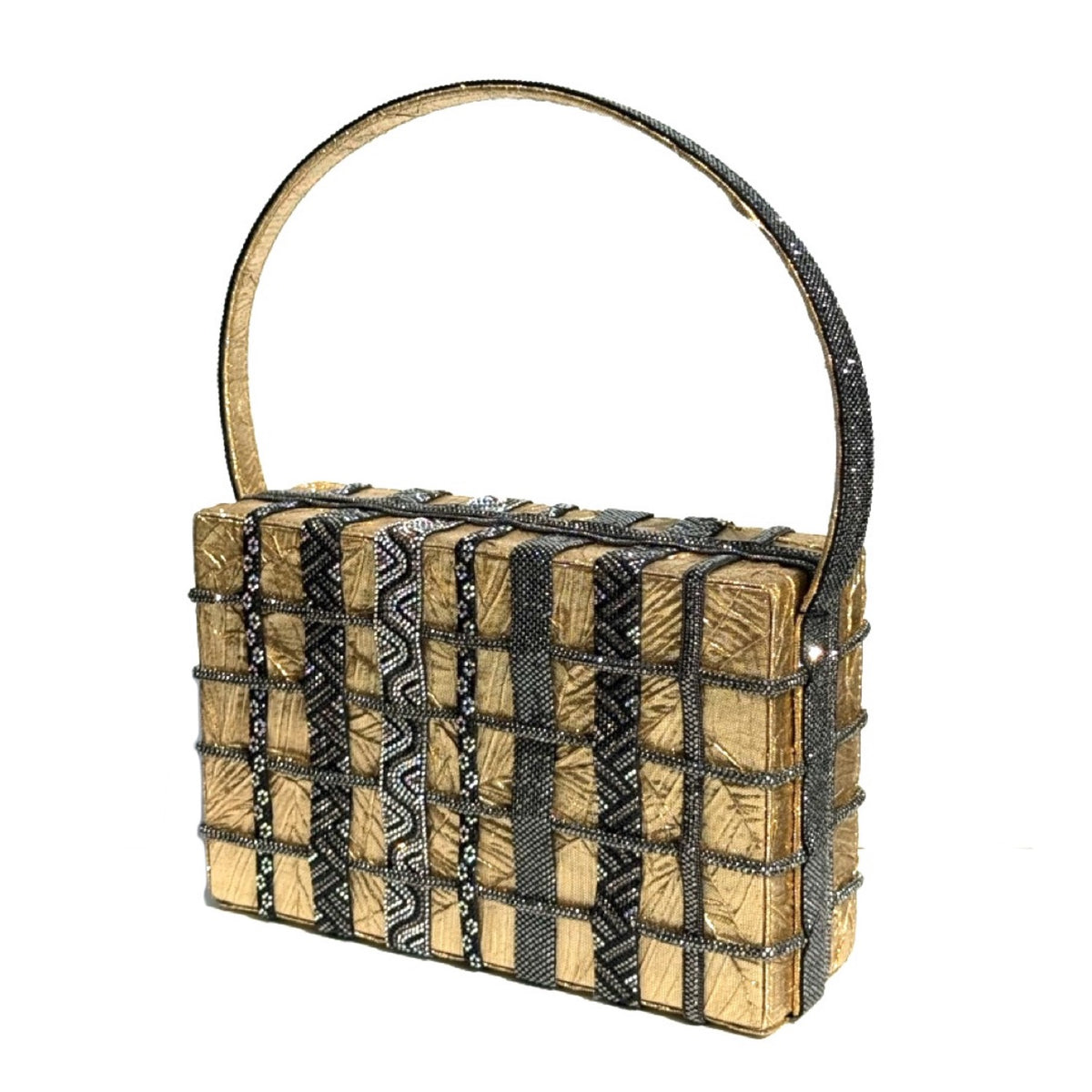 A rectangular handbag with a woven gold and black patterned body, a black handle with gold trim, and silver rhinestone accents, shown on a plain white background.