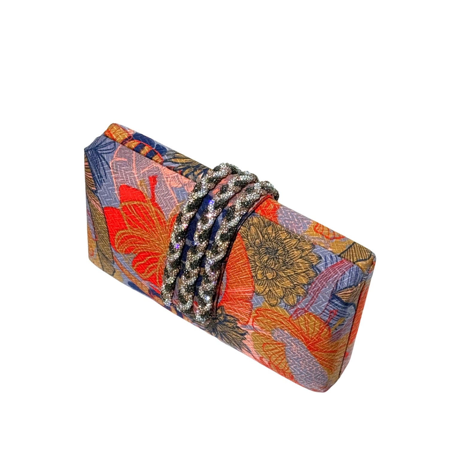 Colorful floral clutch bag with a crystal braided clasp on a white background