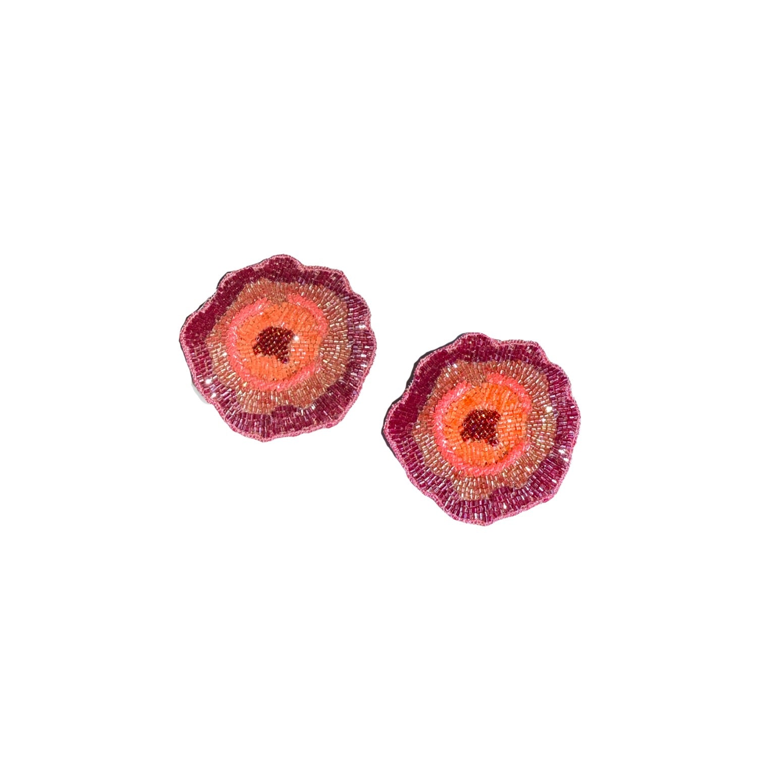 Pair of floral earrings with pink and orange centers 
